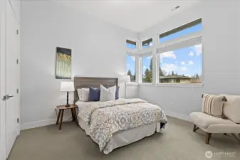 Upstairs Bedroom 2 - Bright, serene, and generously scaled, this secondary bedroom offers comfort, natural light, and a quiet sense of sophistication.