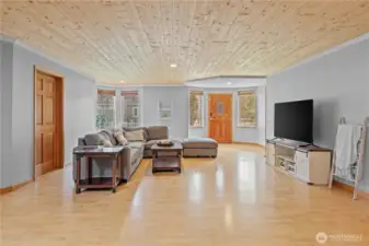 Open-concept living space with flexible layout options—perfect for multi-use living, home office setup, or gathering areas.