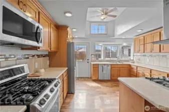 Chef-inspired kitchen featuring dual ovens, propane range, and functional layout designed for entertaining and meal prep.