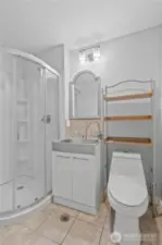 Clean and functional bathroom with modern updates and bright finishes.