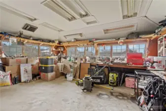 Large attached shop with ample space for tools, storage, or workshop—perfect for hobbyists or business use.