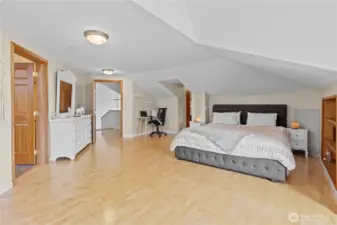 Primary bedroom featuring generous space and natural light for a relaxing atmosphere.