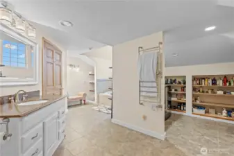 Large bathroom with extended vanity and storage—perfect for busy households.