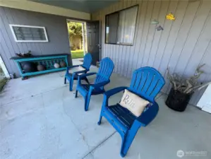Covered back patio located just off the lower level family room can be used year round.