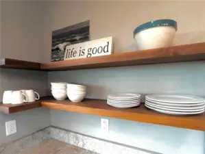 The floating shelves were custom made and can hold tremendous weight.