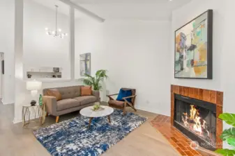 living room with wood burning fireplace