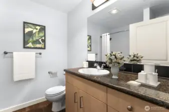 Second bath featuring granite countertops & plenty of storage in the vanity