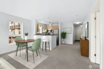 Living room facing breakfast bar & kitchen