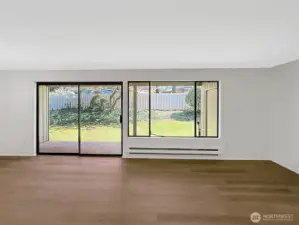 Sliding doors with new blinds that lead to your private back patio.