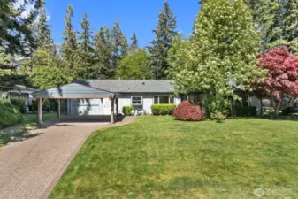 Beautiful brick layed driveway and carport
