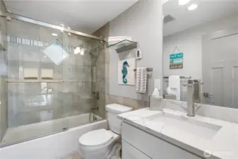Full main-floor guest bath.