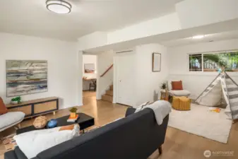 Very spacious family room leads to 3/4 bath and office space.