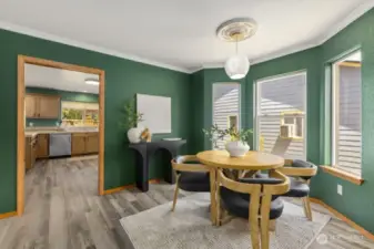 A pocket door between the formal dining room and the kitchen helps to control noise levels and hide any messes.