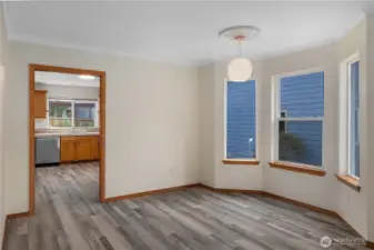 A pocket door between the formal dining room and the kitchen helps to control noise levels and hide any messes.