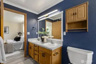 Dual sinks and solid wood cabinets with solid storage.