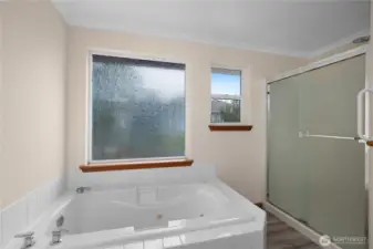 Two windows offer natural light and ventilation.