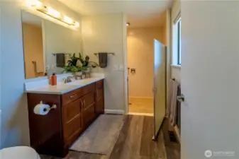 Bath with zero-step shower