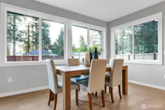 Dining Nook with large windows. Pictures depict a previously built home similar to the home going to be built on this lot. Floor plans, Elevations, colors, upgrades & materials may be different.