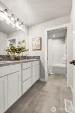 Main upstairs bathroom. Pictures depict a previously built home similar to the home going to be built on this lot. Floor plans, Elevations, colors, upgrades & materials may be different.