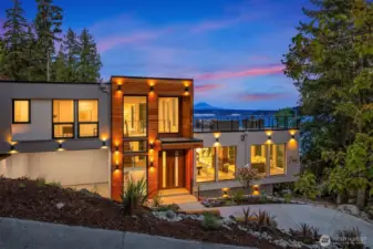 Striking modern design, glowing at sunset, with sweeping views over Lake Washington and Mount Rainier
