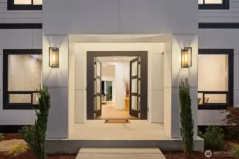 Grand Double Door Entry with Frosted Glass Panels for a Dramatic First Impression