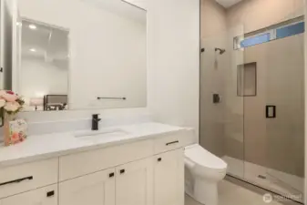 Premium Grohe Faucets and TOTO Toilets with Integrated Bidets in Every Bathroom