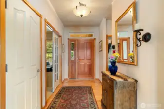 Looking towards the entry.  Office/Bedroom on the left, bedroom and full bath on the right.