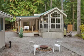 Lot 62 Division 2 Wilderness Way. The Glen at Maples Falls. Beautifully maintained one owner park model with a loft, covered deck, add a room, finished shed/gazebo. All finished with matching siding for a cohesive look.