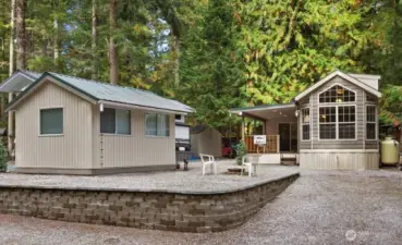 Lot 62 Division 2 Wilderness Way. The Glen at Maples Falls. Beautifully maintained one owner park model with a loft, covered deck, add a room, finished shed/gazebo. All finished with matching siding for a cohesive look.