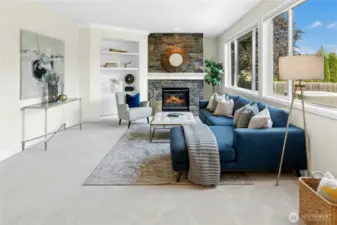 Elegant living room filled with natural light and framed by expansive views.