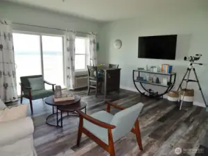 Living/Dining Area w/ a slider to the Rear Deck and Ocean Views.
