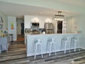 Open Kitchen w/ full-length Eating Bar.