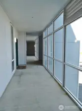 Enclosed hallways (the green door on the left is #S42).