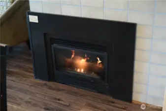 Living/dining area has propane stove to warm you on cooler evenings.