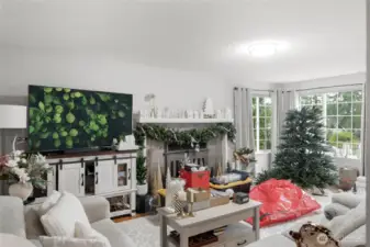 The large Living Room also features a wood-burning fireplace.