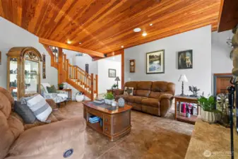 The spacious living area looking toward the front entry.