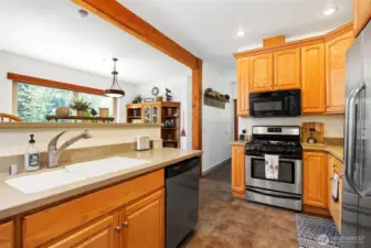 Looking toward the eating bar with the dining room beyond.
