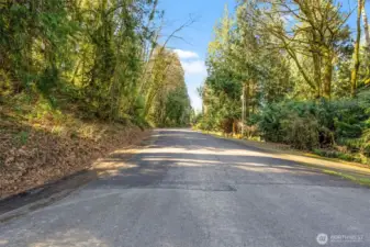 A private, tree-lined approach leads the way to your hidden sanctuary.