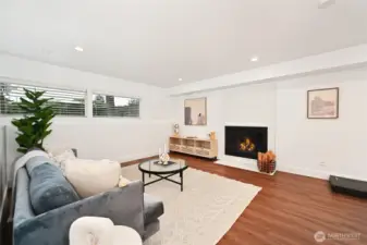 Rec room with wood burning fireplace