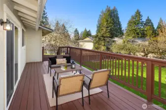 Expansive deck offers space to lounge, grill or dine alfresco!