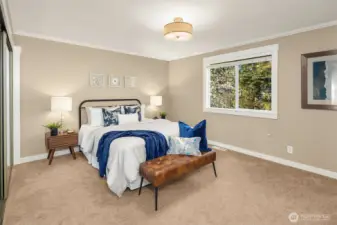 Generous primary bedroom suite