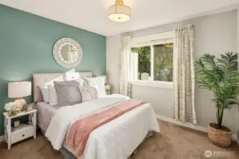 One of two additional secondary bedrooms