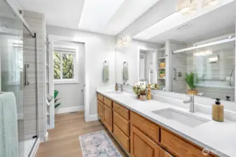 Primary bathroom with double vanity and updated shower.