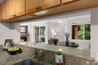 Slab granite counters, include a bar height counter top.