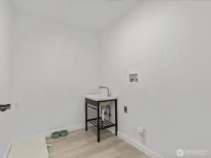 Laundry room next to the upstairs bedrooms! Convenient!