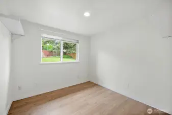 Another bright and spacious bedroom with backyard views—ready to be personalized for comfort, rest, or creativity.