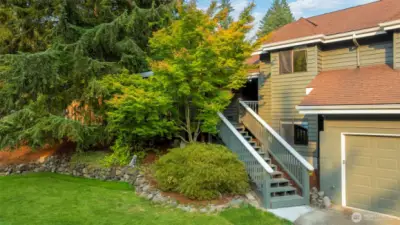 Stairs lead up to entryway& large covered porch. Stairs are NEW.