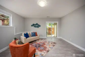 Bonus family room downstairs with new slider to outside patio and hot tub.