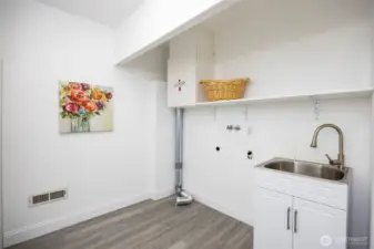 Laundry room and large laundry sink!