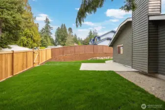 Side yard with new sod & NEW fence.
